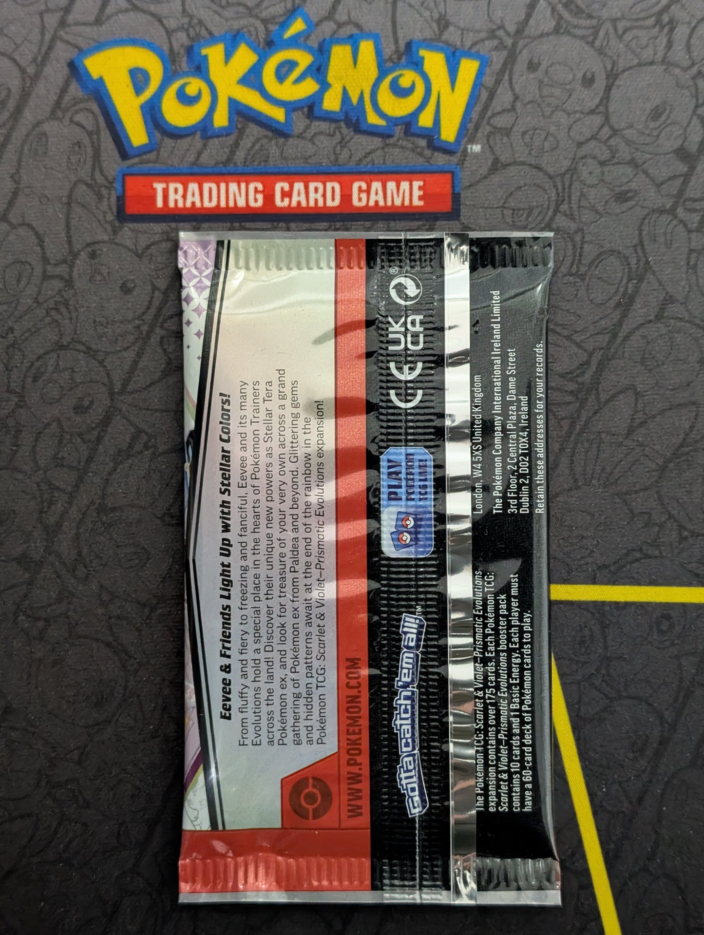 Pokémon - Prismatic Evolutions - Sealed Booster Pack - Back View